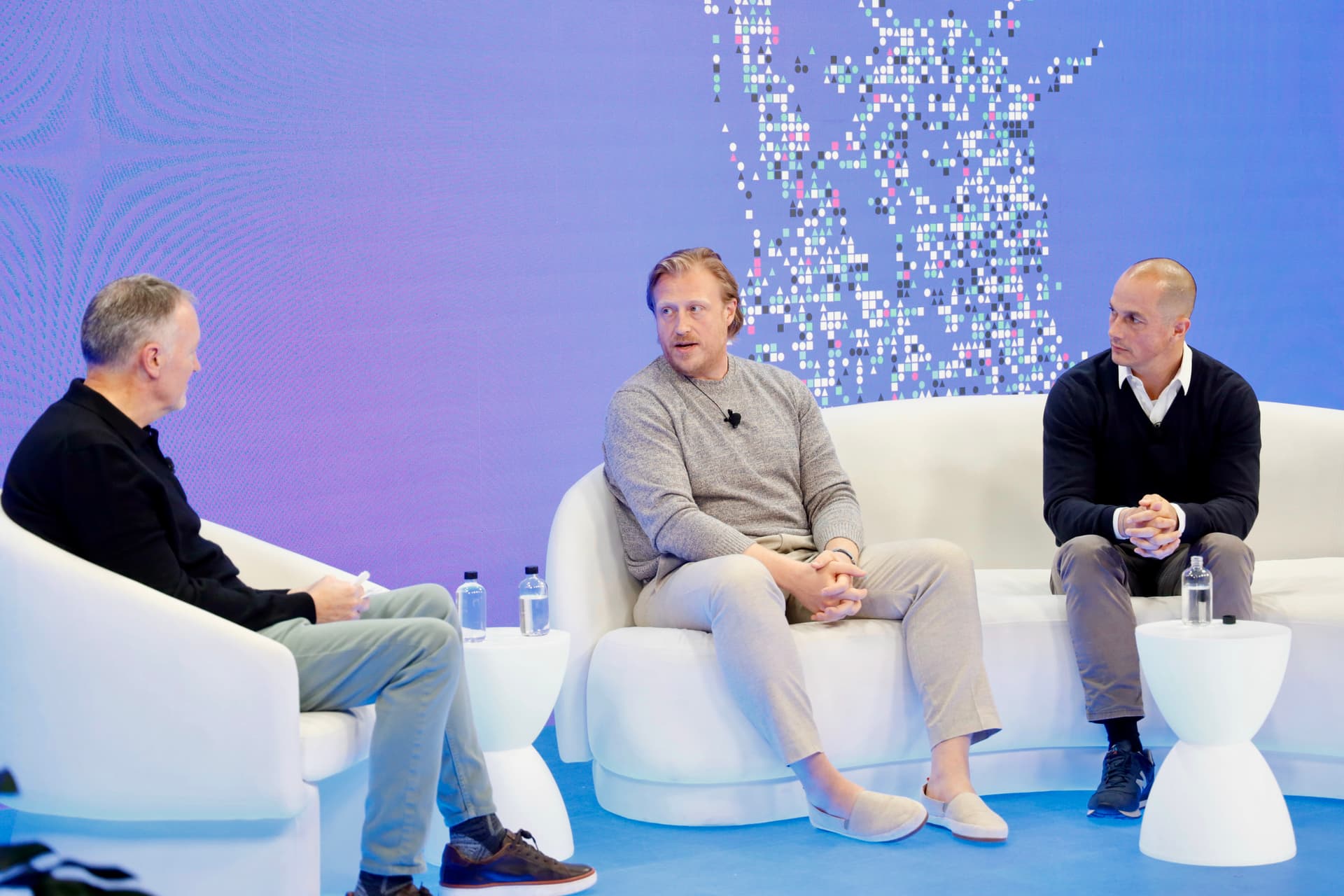 Eric Saraniecki, Christian Rau, and Bill Platt onstage at CoBuild 2026